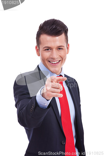 Image of young business man pointing at you 