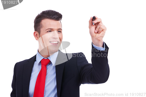 Image of Business man writing with marker