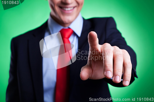 Image of business man pressing an imaginary button