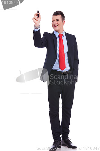 Image of full body picture of a business man writing