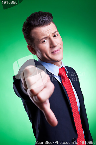 Image of business man with thumbs down