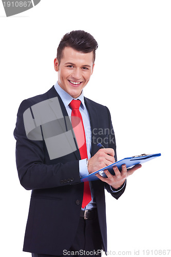 Image of Casual Business man With a Clipboard 