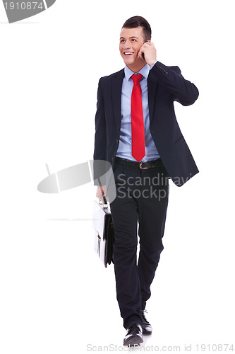 Image of Walking forward while talking on the phone