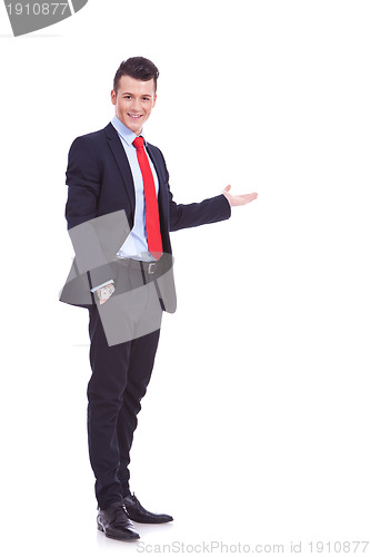 Image of Happy business man giving presentation