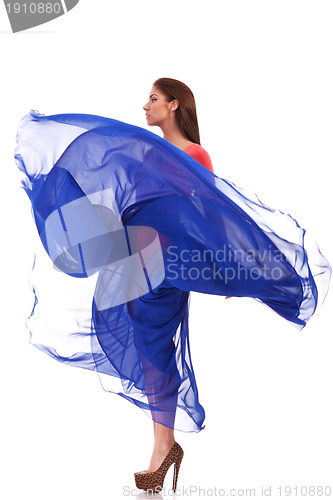Image of beautiful woman in blue waving flying dress 