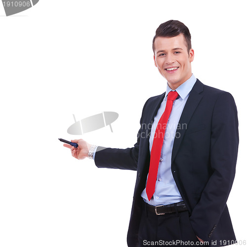 Image of  business man in a suit pointing with a pen