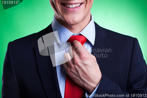 Image of young business man in a suit and tie