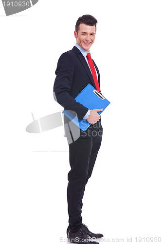 Image of young business man with a blue clipboard