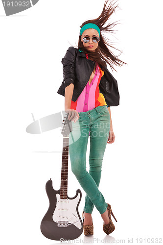 Image of hot rock and roll woman with electric guitar