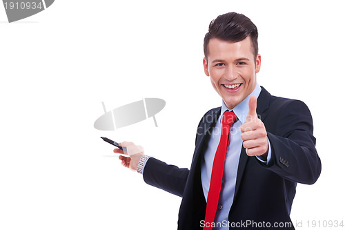 Image of business man presenting something and giving the ok for it