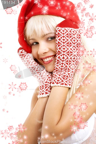 Image of santa helper girl with snowflakes