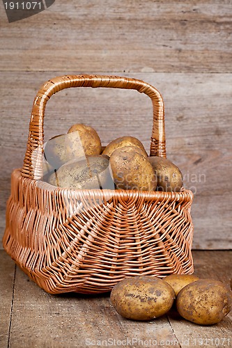 Image of basket with fresh potatoes 