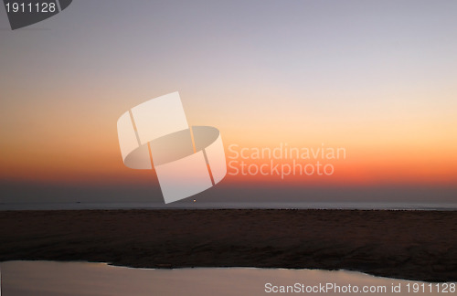 Image of Fishing Vessels at Sunset