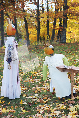 Image of Pumpkin people outside during fall