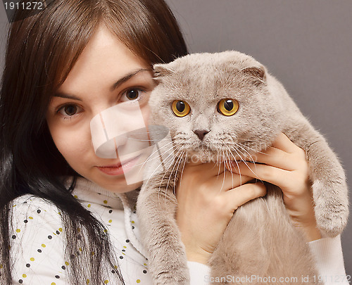 Image of girl with cat