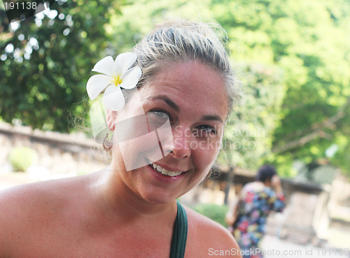 Image of Happy woman on a tropical holiday