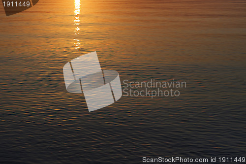 Image of Beautiful sunrise sea water background