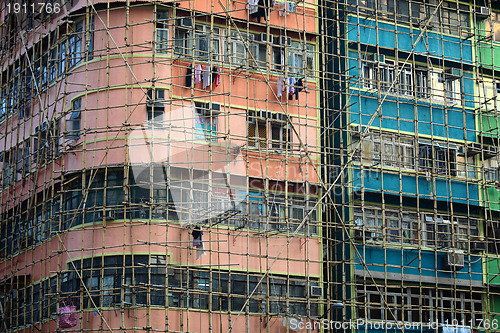 Image of bamboo scaffolding of repairing old building