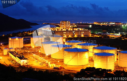 Image of oil tank at night