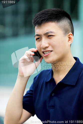 Image of asian man with cell phone