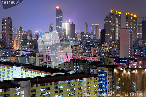 Image of apartment building in Hong Kong at night