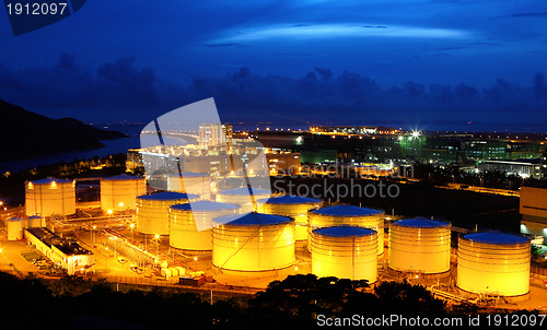 Image of Oil tanks at night