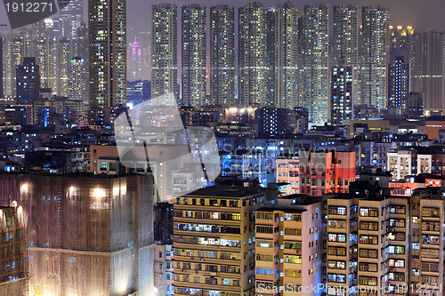 Image of apartment building in Hong Kong at night