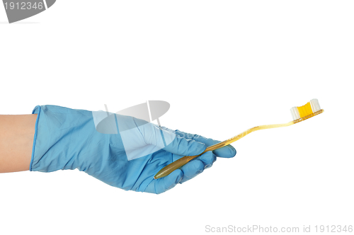 Image of yellow toothbrush