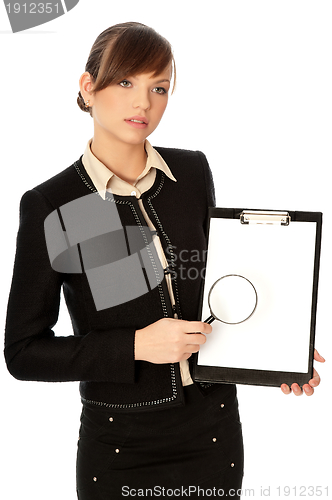 Image of White blank paper with a magnifier