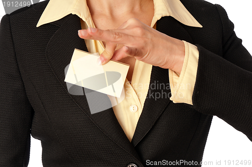 Image of woman showing her badge