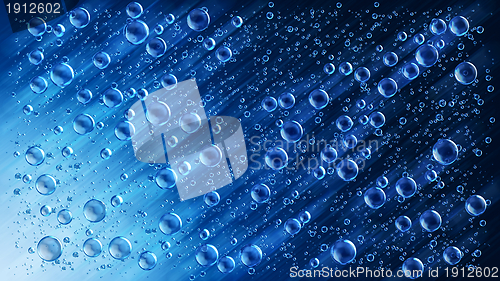 Image of blue motion water drops in the rain