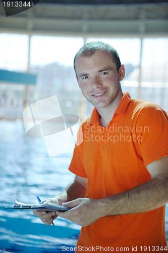 Image of happy childrens at swimming pool