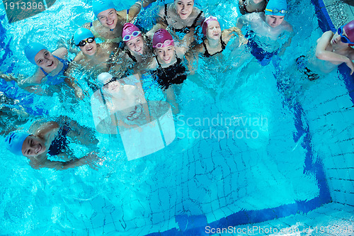 Image of happy childrens at swimming pool