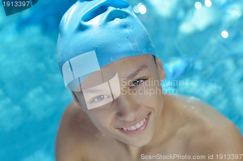 Image of happy child on swimming pool