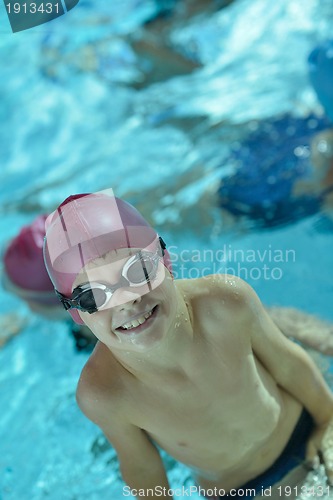 Image of happy child on swimming pool