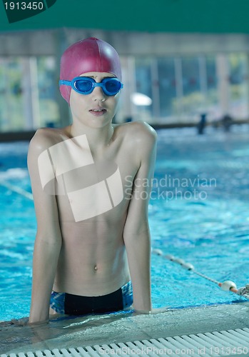 Image of happy child on swimming pool