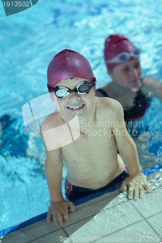 Image of happy child on swimming pool
