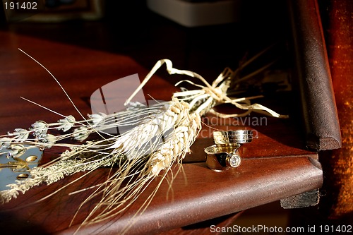 Image of Wedding rings and wheat