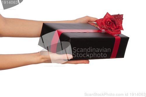 Image of gift with red bow