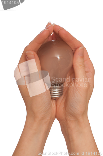 Image of lamp in the womans hand