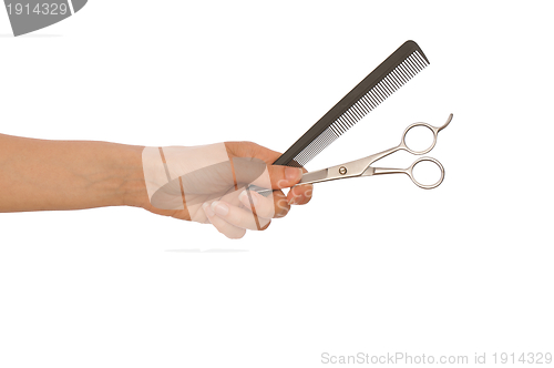 Image of scissors and hairbrush