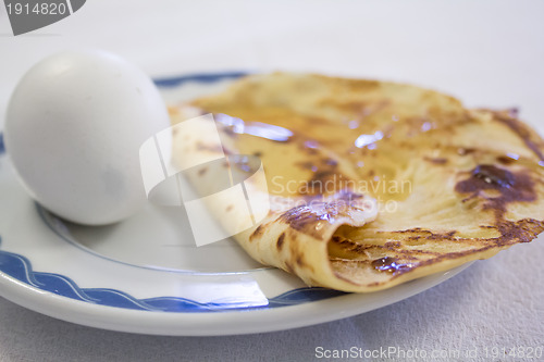 Image of Boiled eggs and pancake