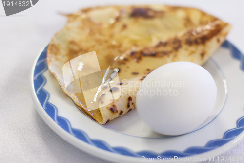 Image of Boiled eggs and pancake