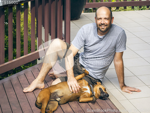 Image of man and dog