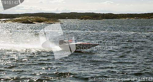 Image of Small speed boat.