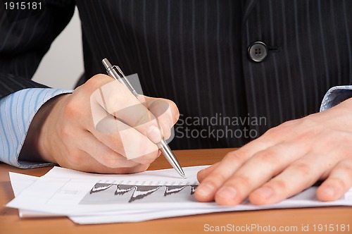 Image of businessman working in office