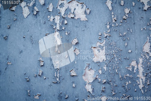Image of peeling blue grunge background