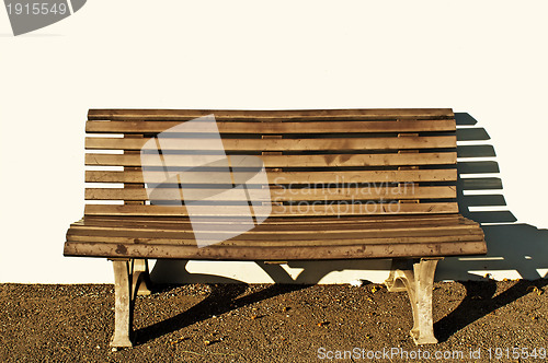 Image of park bench with sun
