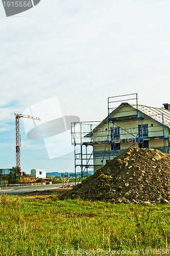 Image of house with scaffold