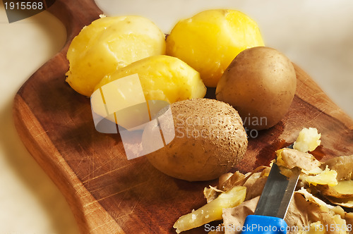 Image of peeling potatoes